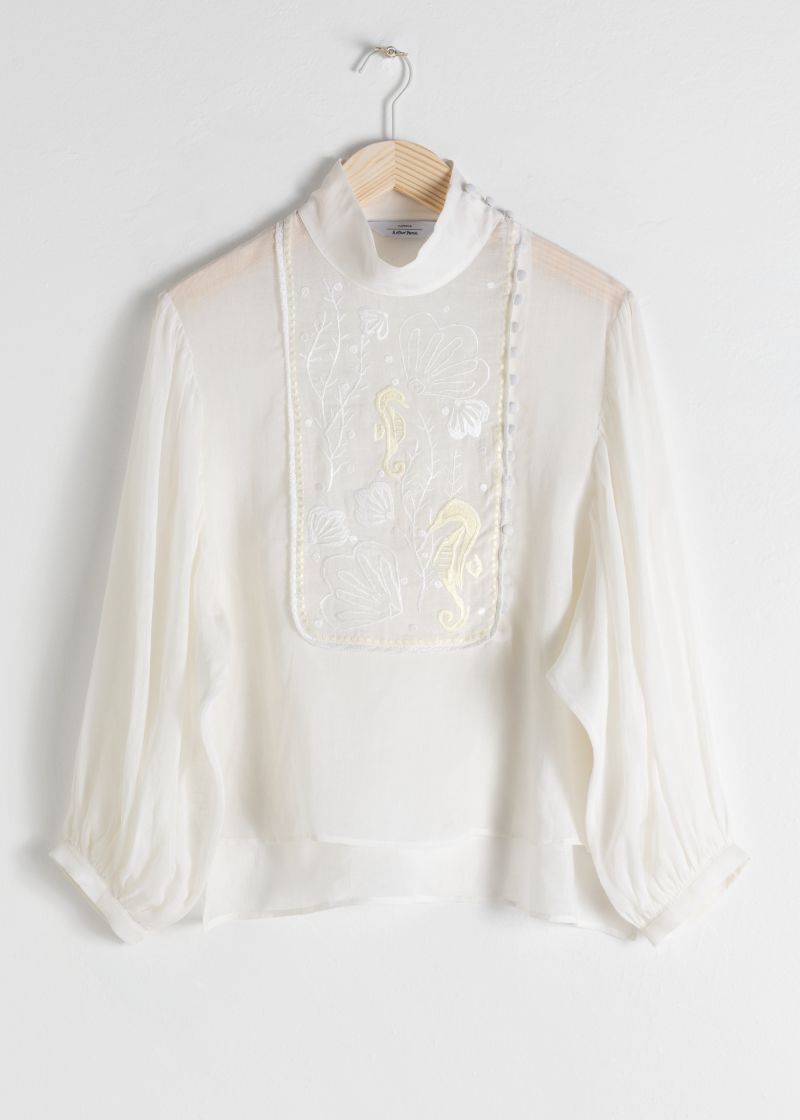 Bestickte transparente Bluse aus Leinenmix