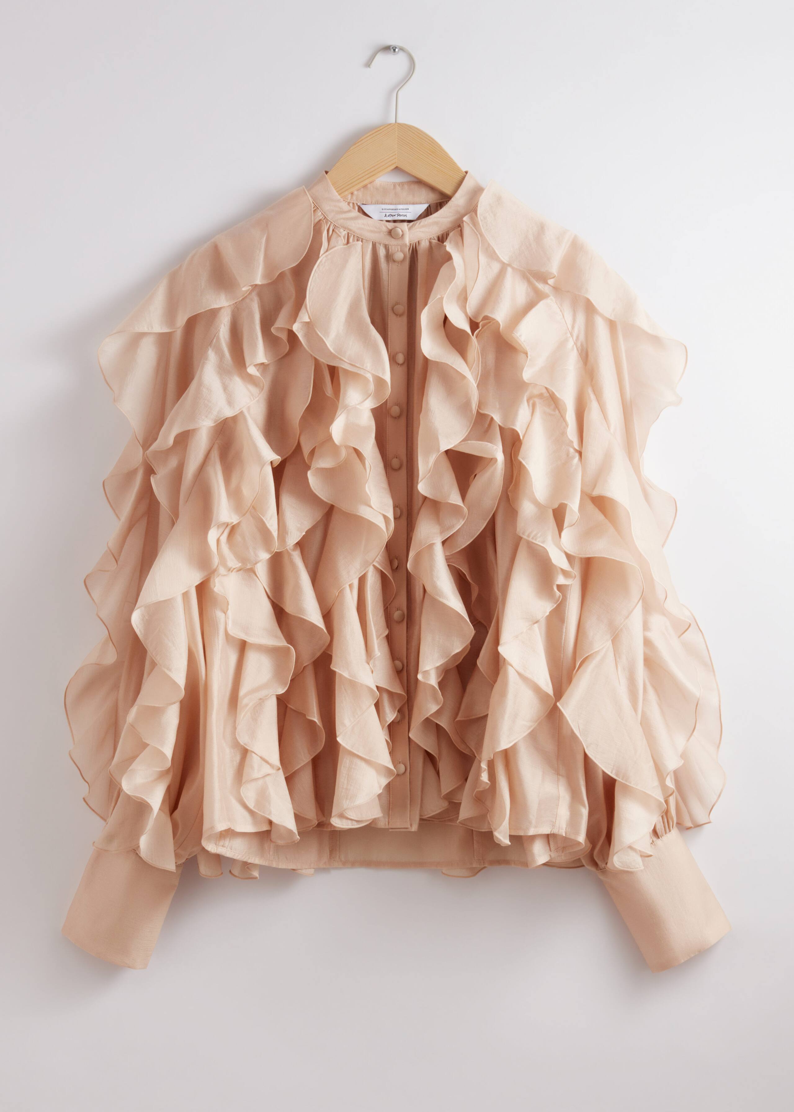 beige ruffle blouse